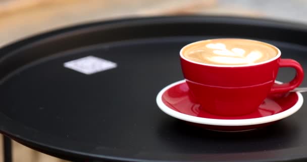 Red Cup Coffee Latte Art Black Table Place Text — Stock Video