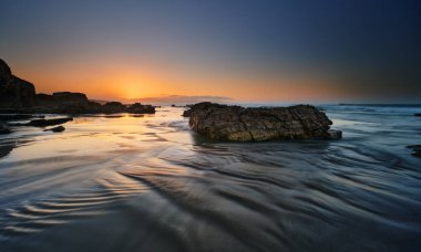 Costa de Ribadeo Galicia Lugo- Ribadeo beach sunset clipart
