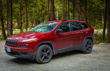 Jeep Cherokee front view, three quarters view, headlight off-April 27,2022-Vancouver BC, Canada. Street view, nobody, editorial