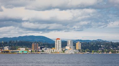 A beautiful view of downtown of Nanaimo from seaside in overcast day. Travel photo, copy space for text-July 18,2022-Vancouver Island BC Canada clipart