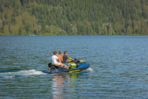 Father His Sons Having Fun Jumping Wave Riding Jet Ski — Zdjęcie stockowe