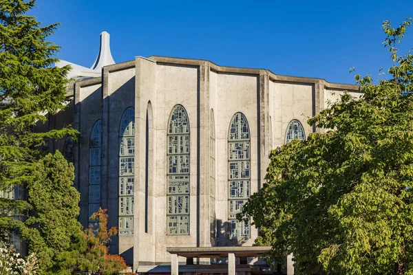 Bell tower of ancient church, isolated on blue sky. Westminster Abbey Cathedral, Canada, Seminary of Christ the King-August 8,2022-Nobody, travel photo