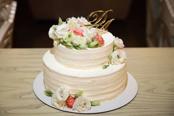 Wedding cake. Birthday cake with decorations. Culinary arts desserts. Wedding cake with decoration. The art of cooking in sweet dishes.