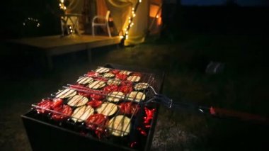 Budget glamping for family outdoor recreation. Glamping terrace in the forest. Cute fabric tents, in a forest environment in an eco camp. 