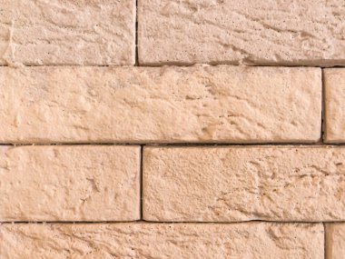 Doku, tuğla arka plan. Hafif bir tuğlaya yakın çekim.