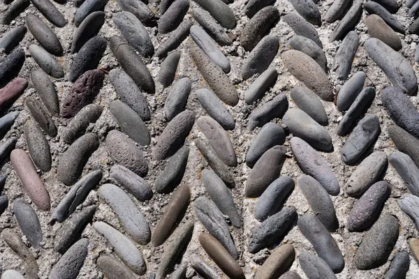 面白いハーリンボーン型の小石舗装 — ストック写真