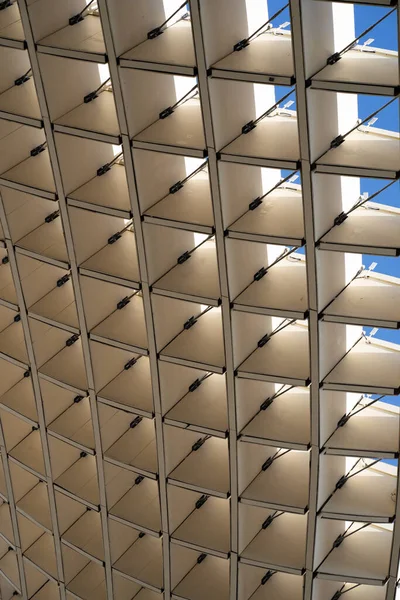 interesting building design that forms a different pattern and the background is a blue sky