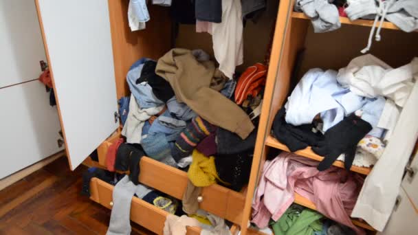 Hand Throws Clothes Pile Used Clothes Pile Used Clothes Light — Stock Video