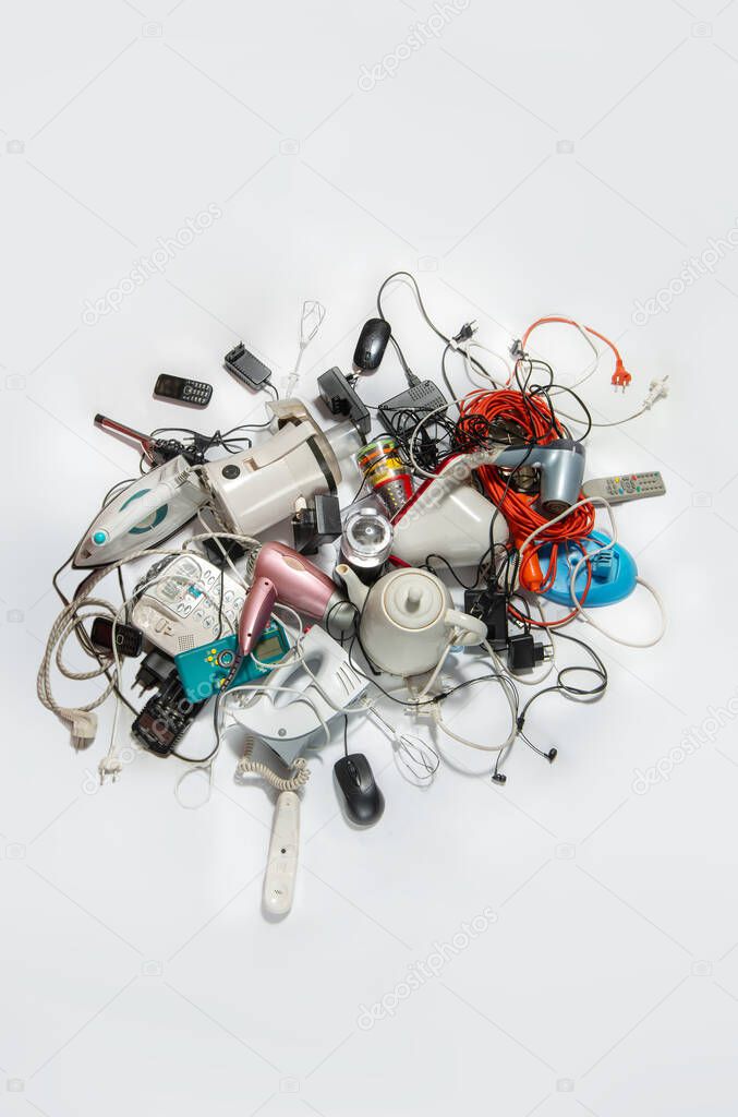 Lots of old electrical appliances for recycling e-waste. Sustainable living concept.