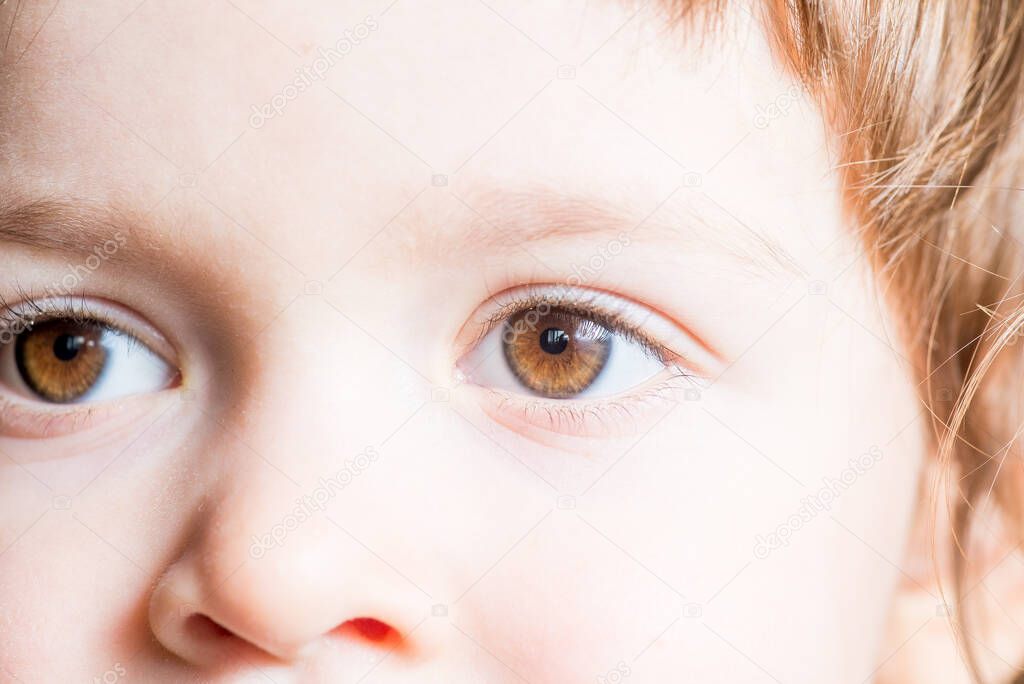 baby dark brown eyes close-up. 