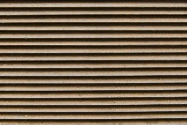 Tahta panjurlar. Dökümlü dar tahtaları olan arkaplan