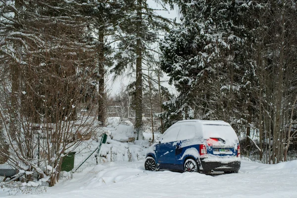 Blue Microcar Parked Street Covered Snow Cloudy Winter Day — Stok fotoğraf