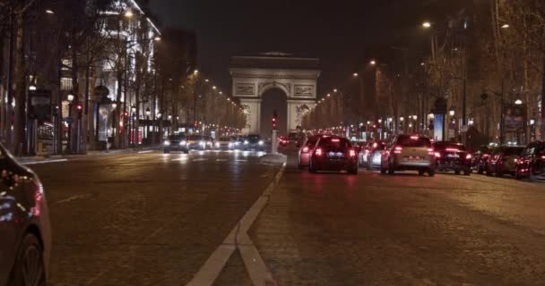 Dugó Champs Lyses Előtt Arch Triumph Arc Triomphe Éjjel — Stock videók