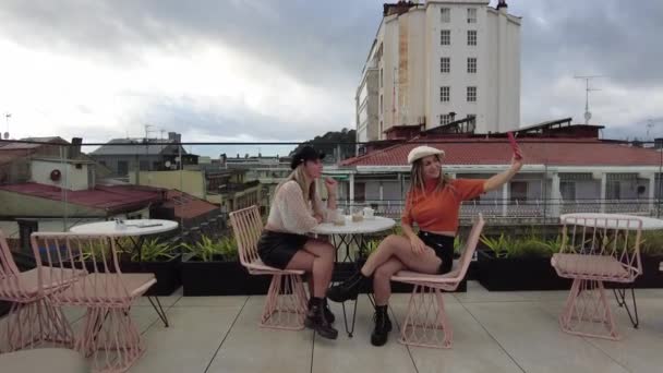 Blond Smiling Woman Chatting Long Haired Friend While Sitting Together — Stock Video