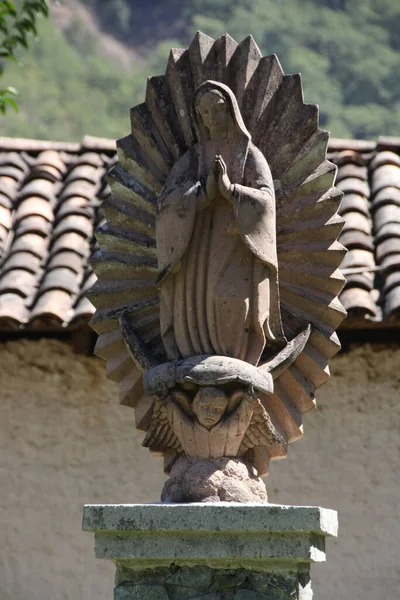 Sculpture Virgin Guadalupe Atrium Temple 图库照片