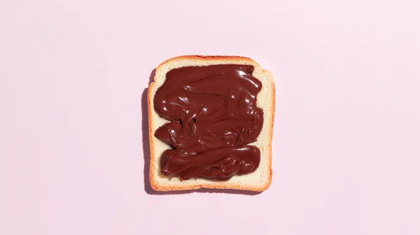 Підсмажений Хліб Шоколадом Рожевому Фоні Високоякісна Фотографія — стокове фото