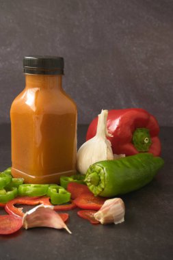 Andalusian gazpacho served in a plastic bottle ready to go. Take away. Tomato, pepper and fresh ve