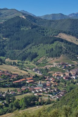 Panoramic views of the town of Potes from Mount Arabades on a sunny day, Picos de Europa Natural Park, Cantabria, Spain