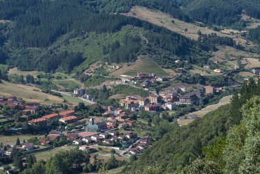 Panoramic views of the town of Potes from Mount Arabades on a sunny day, Picos de Europa Natural Park, Cantabria, Spain