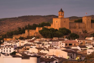 Alcazaba de Antequera, also known as Fortaleza del Papabellotas. Beautiful views at sunset of the Keep and the white houses of the town.