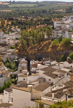 SETENIL DE LAS BODEGAS, CADIZ, SPAIN, SEPTEMBER, 5, 2022: Views of the village of Setenil in Andalucia,Spain,famous for being one of the most beautiful villages in Spain and for its famous cave houses