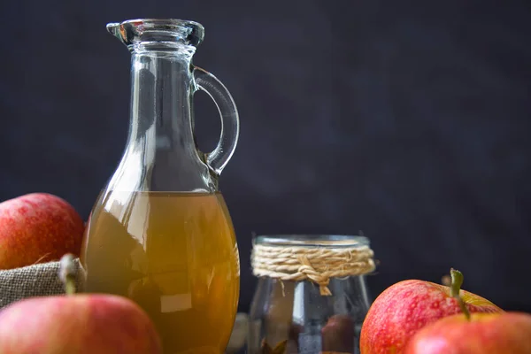 Apple cider vinegar, used for weight loss, helps with intermittent fasting, lowers cholesterol and blood sugar levels, and improves symptoms of diabetes. Healthy, organic diet. Selective focus