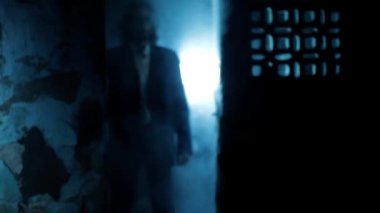 Cinematic shot of a serial killer in a suit coming out of the door and shooting with smoke and dramatic lighting. 