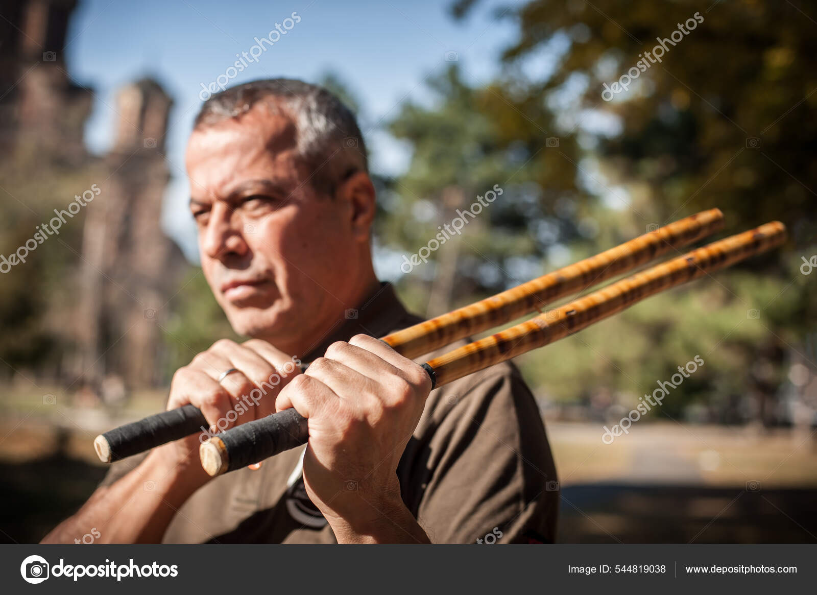 Escrima Kapap Instructor Demonstrates Sticks Fighting Techniques Public