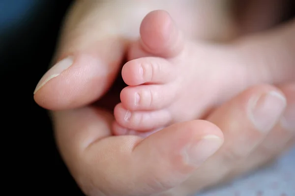 Close Detail Mother Holding Cute Soft Baby Small Leg Her — Stockfoto