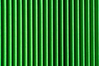 kıvrımlı kartonların yeşil çizgili arkaplanı