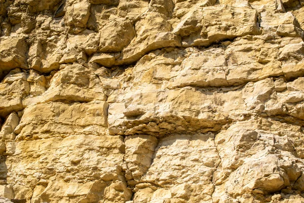 Taş ocağı duvarı, arkaplan veya taş, kireç taşı, dolomit içeren doku