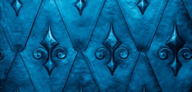 Mavi plaka üzerindeki dekorasyonlar, arkaplan