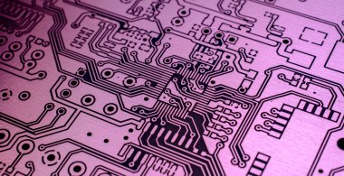 a printed circuit board in red