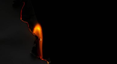 Yanan kağıt, parlayan kağıt kenarı siyah arkaplan üzerinde