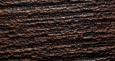 etched metal pitting background, close-up