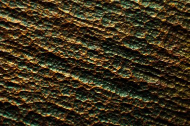etched metal pitting background, close-up