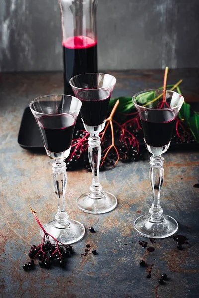 Three Glasses Elderberry Liqueur Dark Background — 스톡 사진