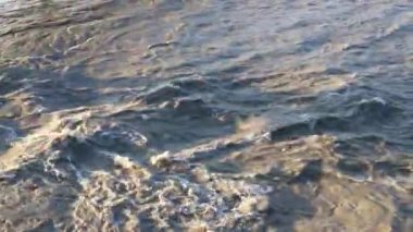 Climate change affect flooding in rivers with big waves submerging fields and towns