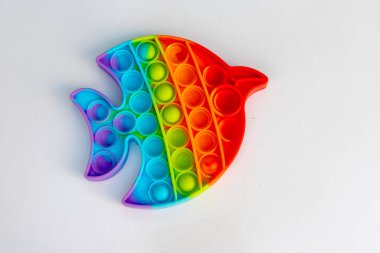 Colorful anti-stress touch pop it toys fidget on a white isolated background