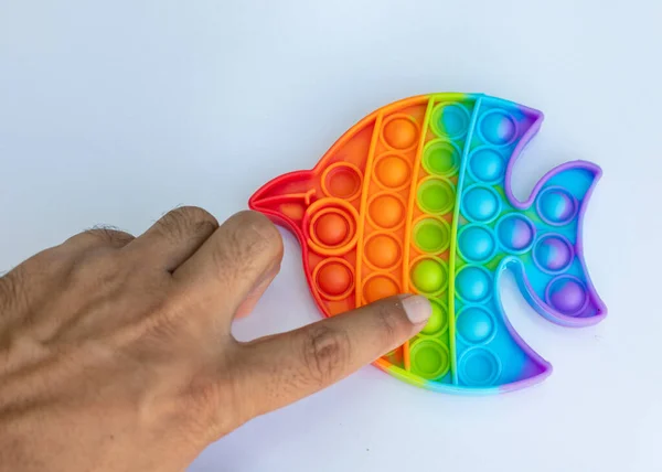 Man Pushing Pop Bubble Fidget Toys Anxiety Stress Relief — Stockfoto