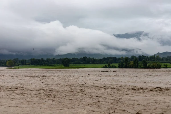 The heavy water current washed away a huge portion of agriculture fields and infrastructure in the valley