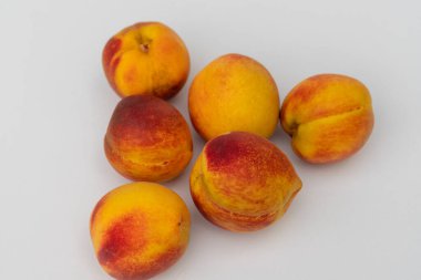Fresh organic peach fruit isolated on white background