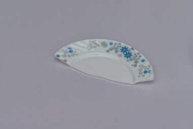 Piece of broken ceramic plate