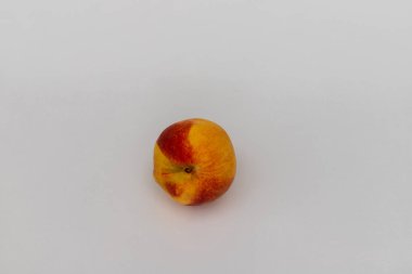 Peach fruit isolated on white background with selective focus
