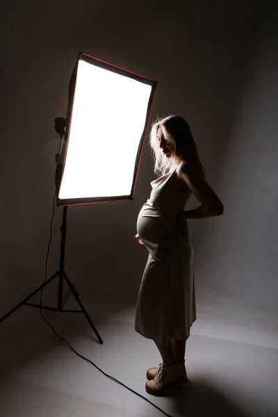 Pregnant Woman Black Suit Strokes Her Belly White Background Girl — Fotografia de Stock