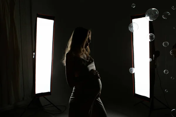 Pregnant Woman Black Suit Strokes Her Belly White Background Girl — Fotografia de Stock