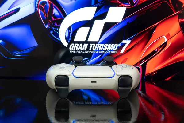 Playstation Controller Con Gran Turismo Logo Sfondo Messa Fuoco Selettiva — Foto Stock