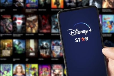 Disney Plus and Star Plus logo on Smarthphone screen, 6 Apr, 2022, Sao Paulo, Brazil clipart