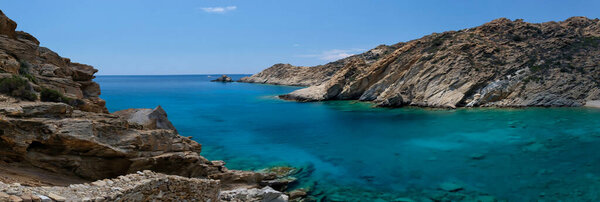 View of the most amazing turquoise beach of Tripiti, on a beautiful day on the island of Ios Greece