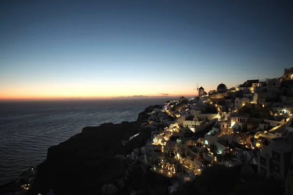 Vista Panoramica Del Villaggio Illuminato Mozzafiato Oia Tramonto Incredibile Santorini — Foto Stock